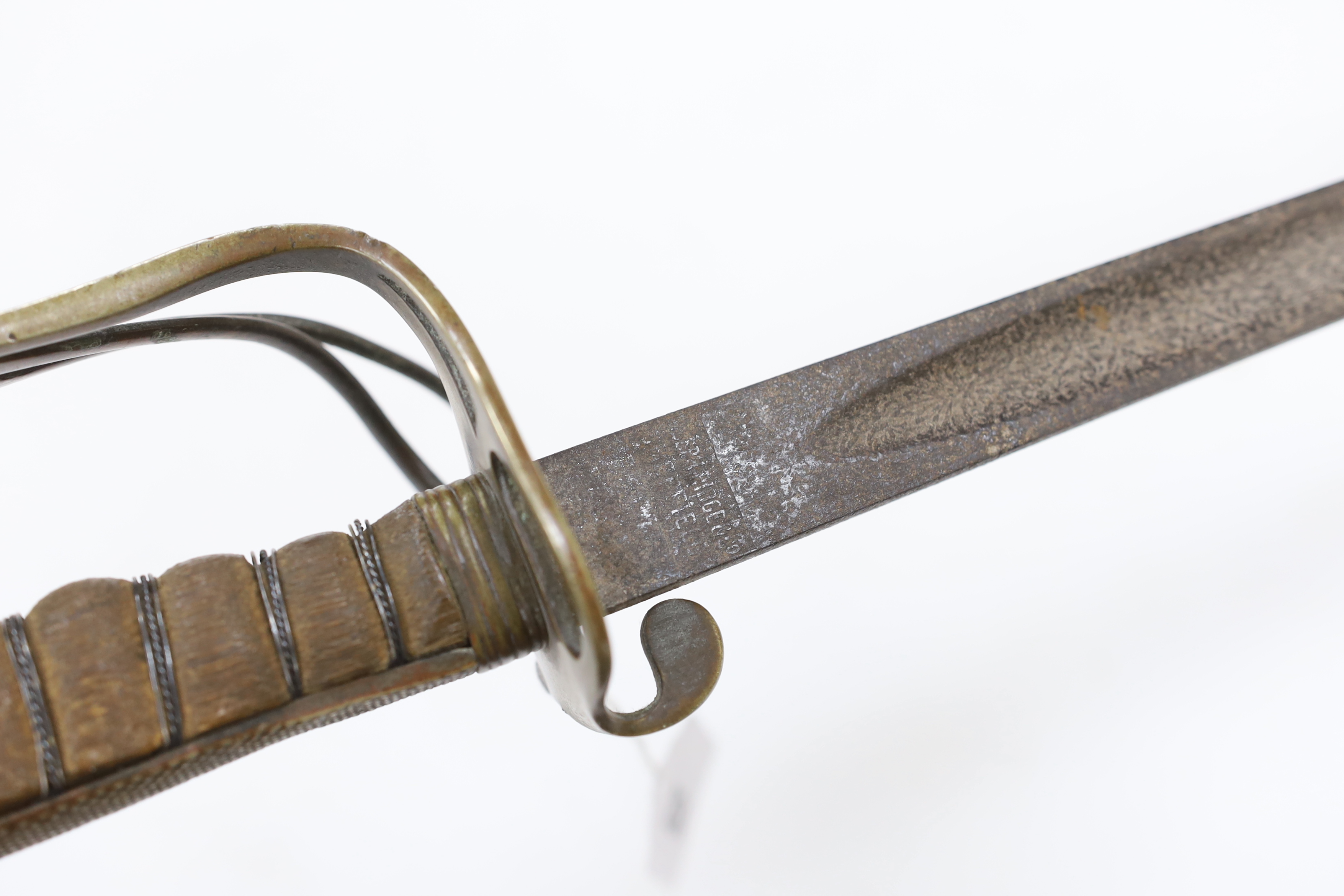 A World War I artillery officer’s sword with nickel guard, blade 82cm